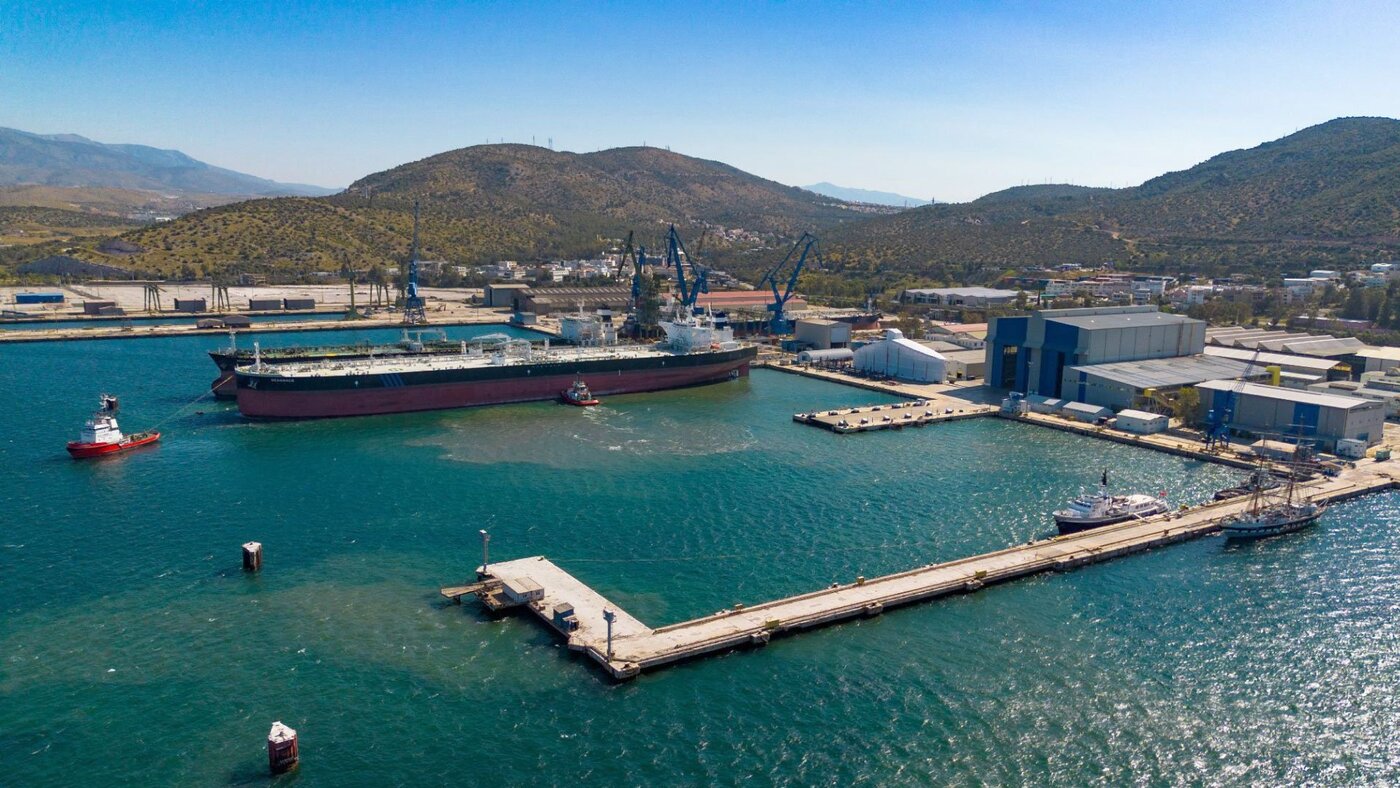 Aerial view of Elefsis shipyard with tugs and tanker