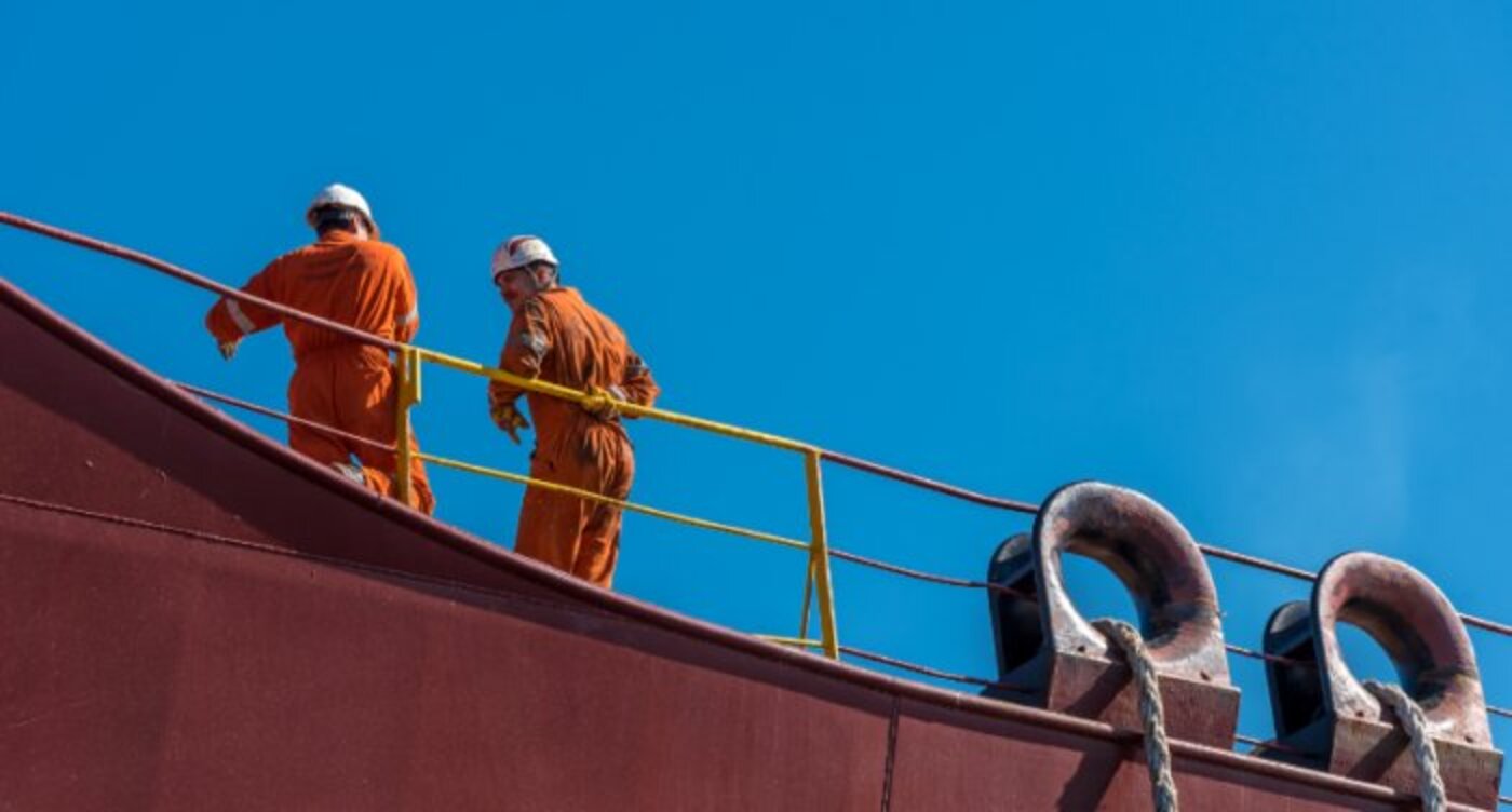 Crew members on deck of a commercial vessel